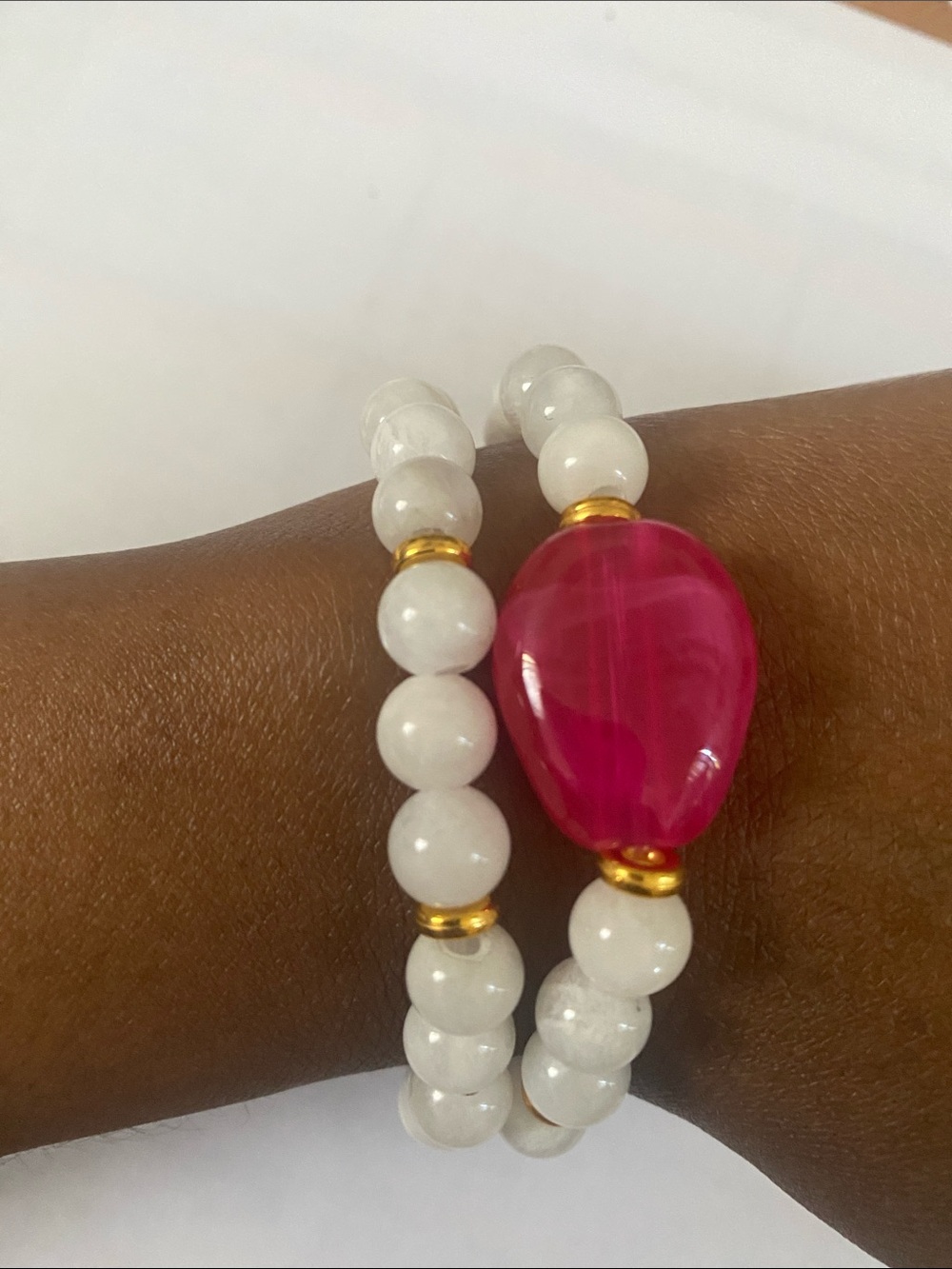 Handcrafted White Beaded Bracelet with Pink Focal Stone and Gold Accents